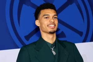 Victor Wembanyama Soars in Size 21 Shoes at NBA Draft With Green Louis Vuitton ‘Alien’ Suit on the Red Carpet